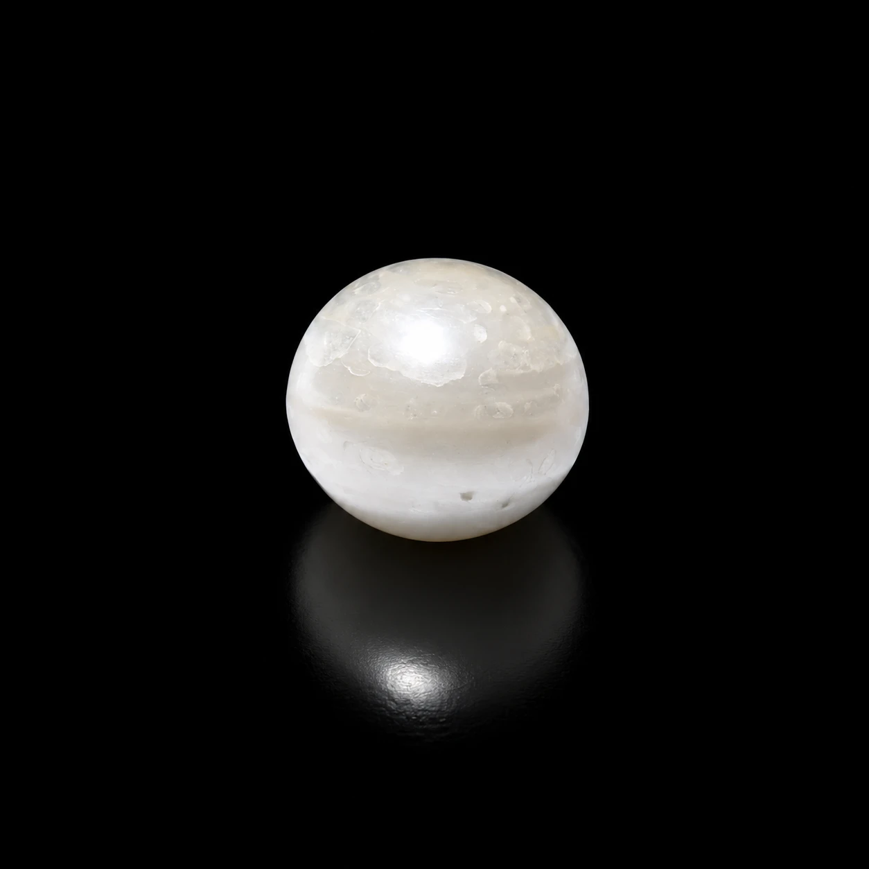 10.60 ct Hyderabadi Pearl stone black background