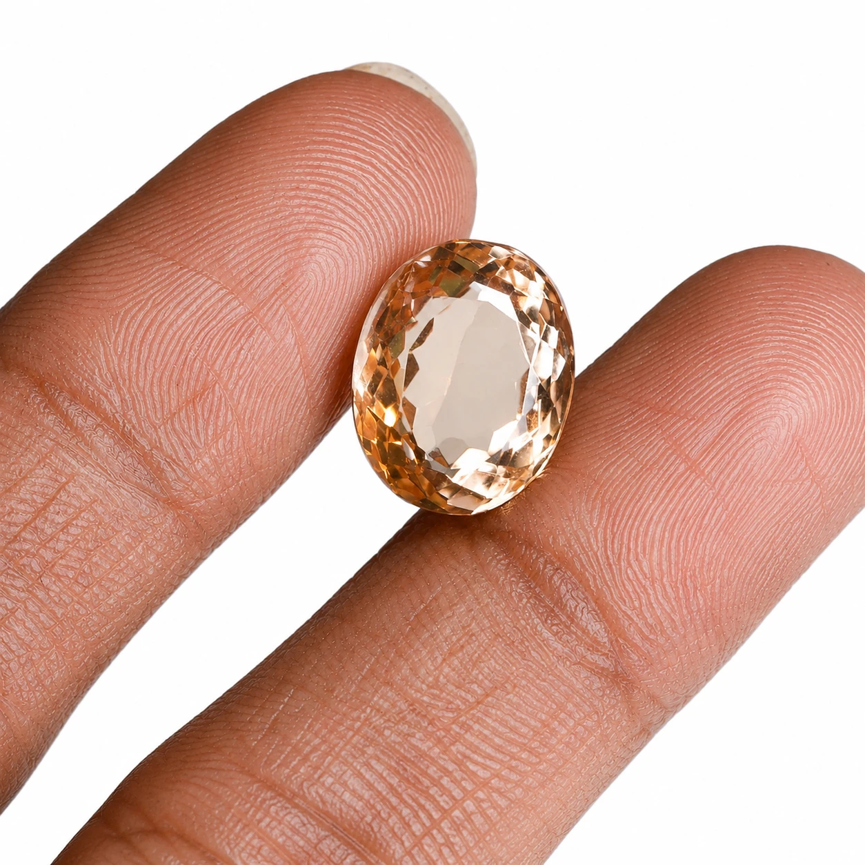 9.75 ct Natural Yellow Topaz Gemstone with finger