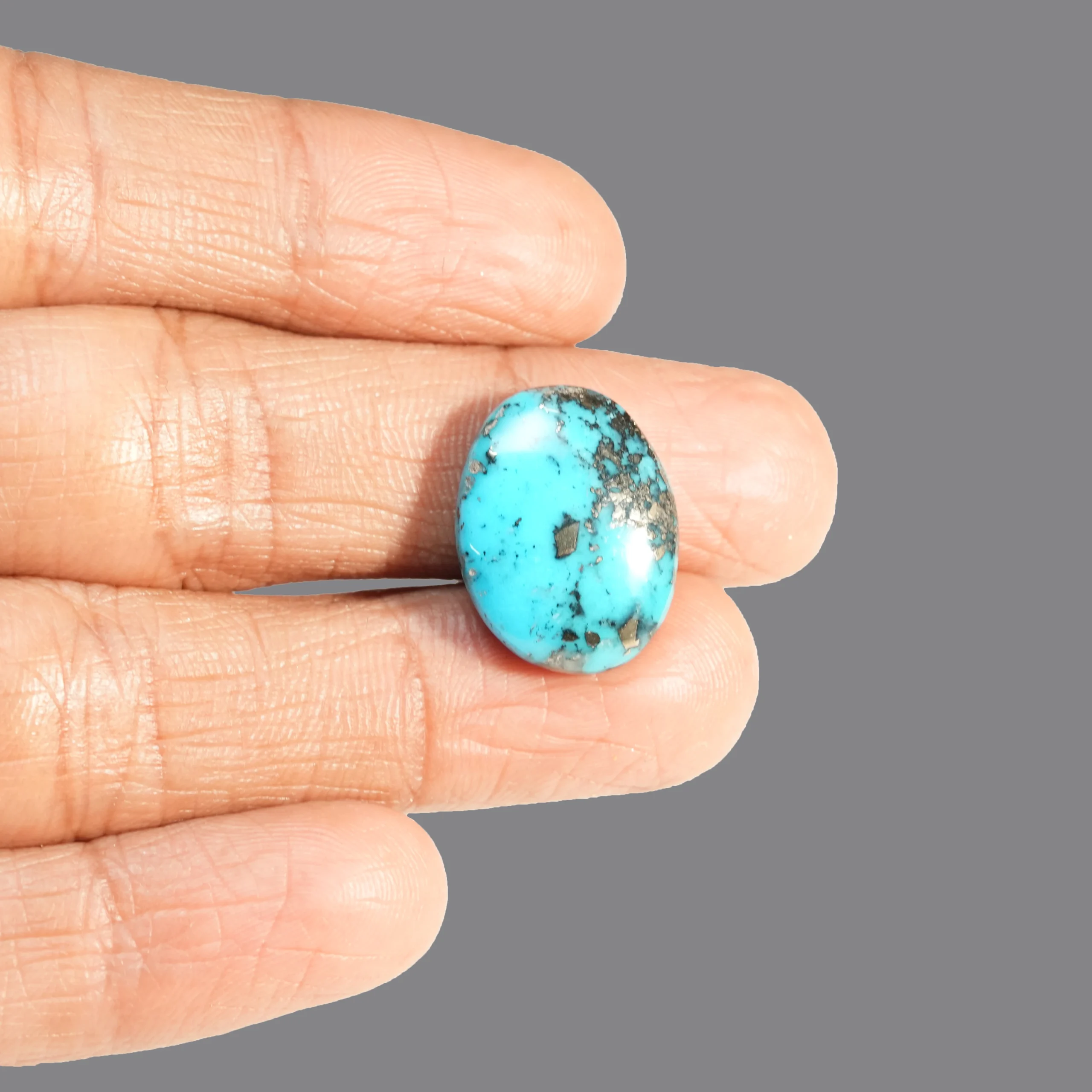 Natural Turquoise Gemstone with finger