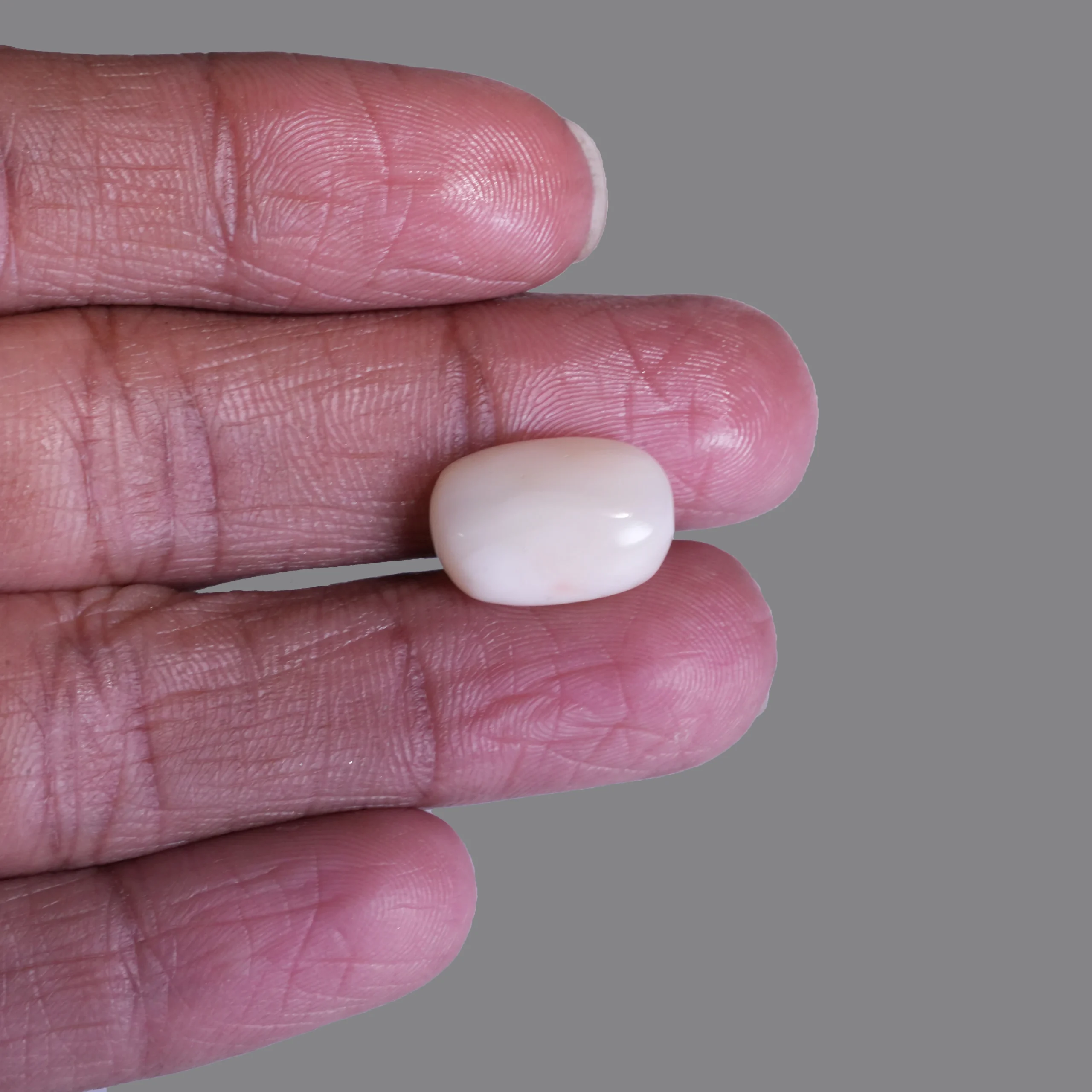 6.90ct Natural White Coral with finger