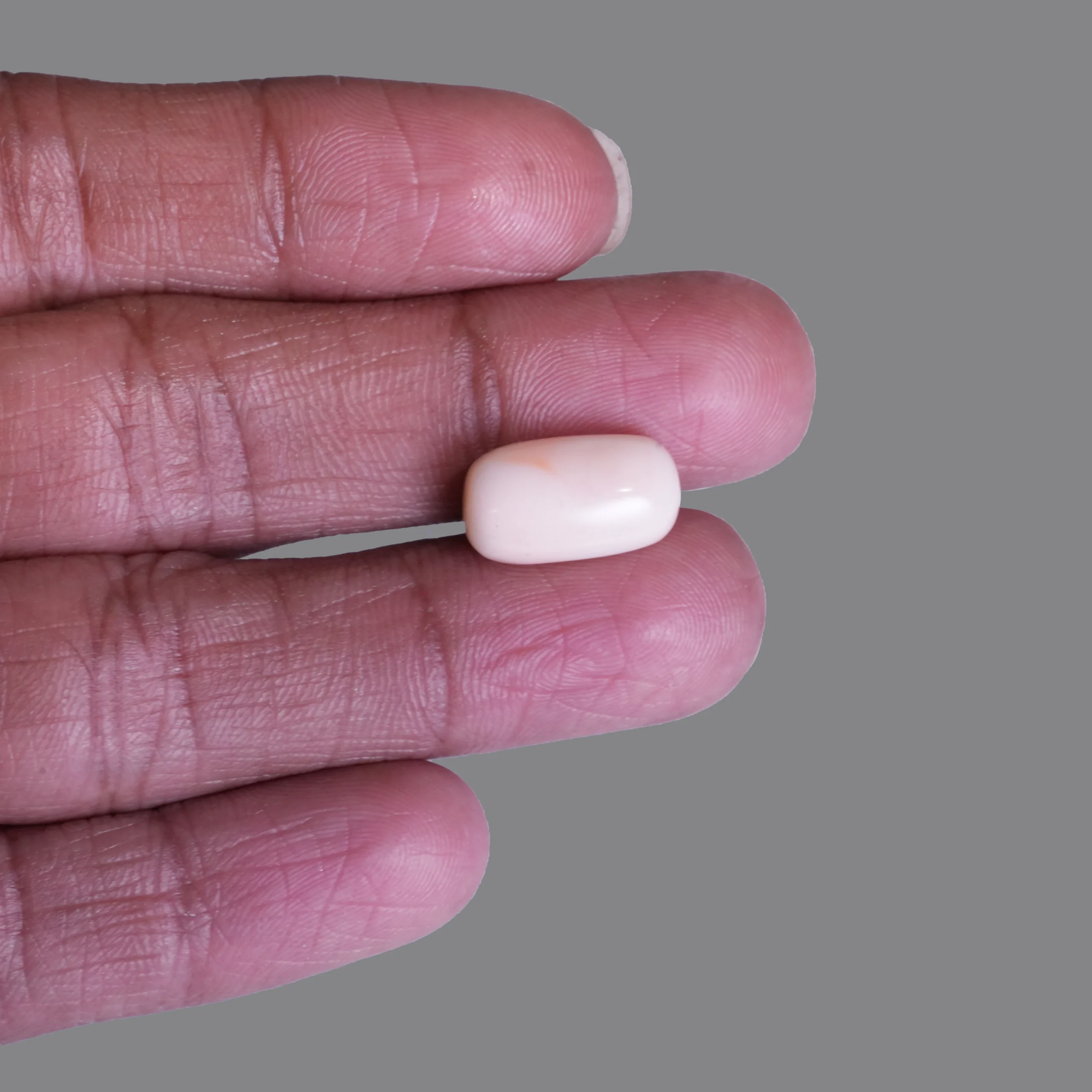 7.10 ct Natural White Coral gemstone with finger