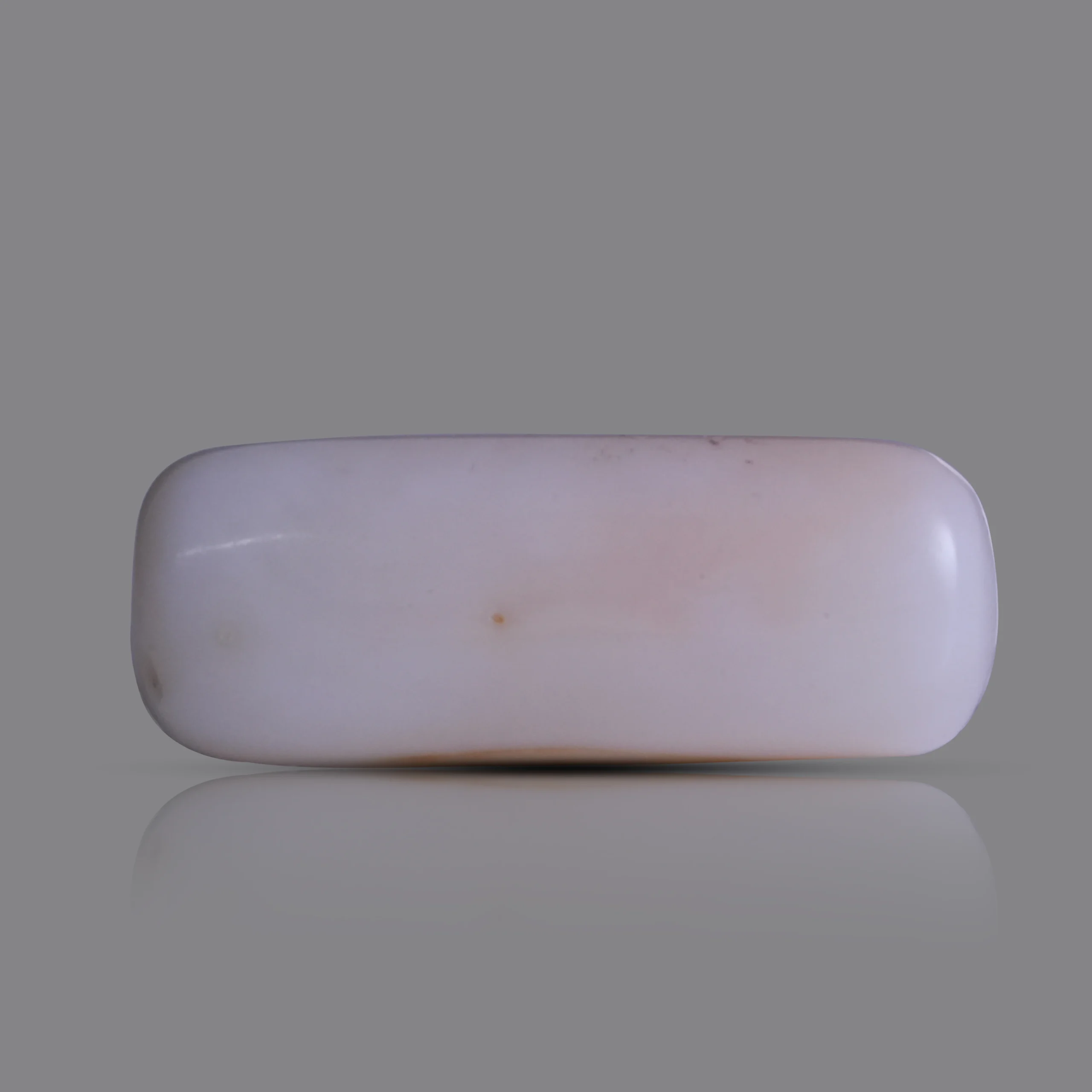 7.35 ct white coral stone with finger