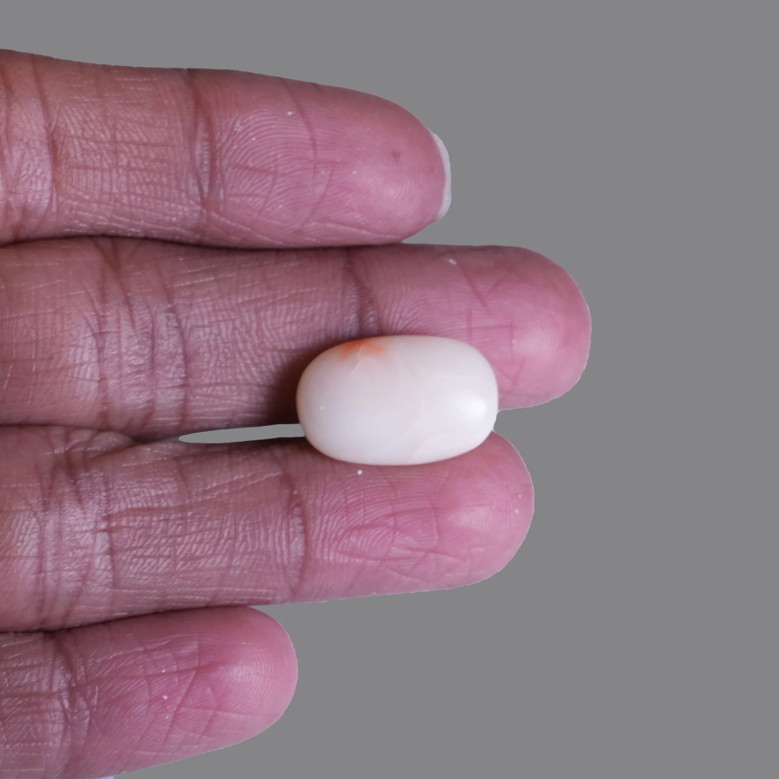 11 ct white coral stone with finger